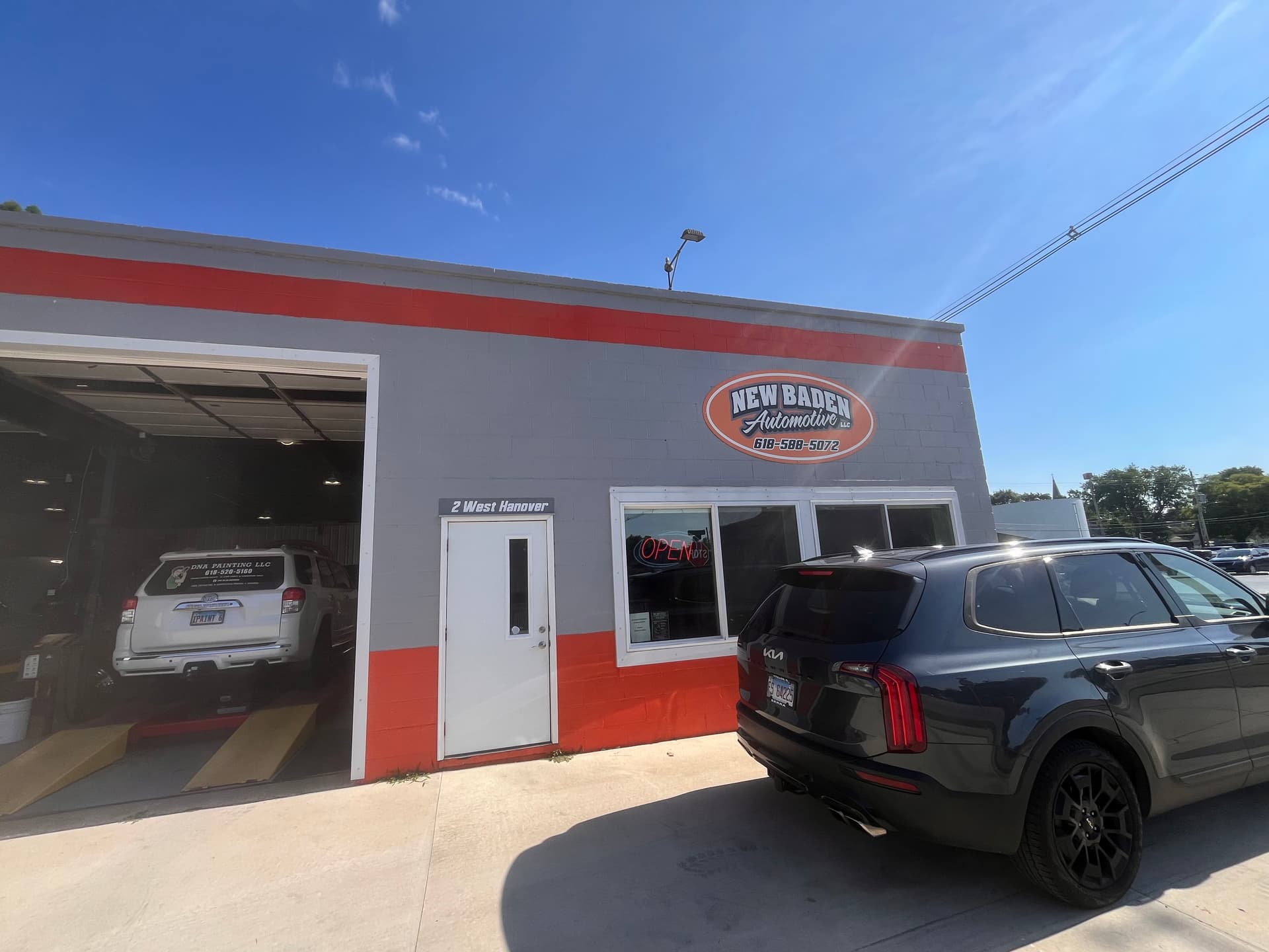 Gallery photos for Custom White Roller Shades Installed at New Baden Automotive: Image #1