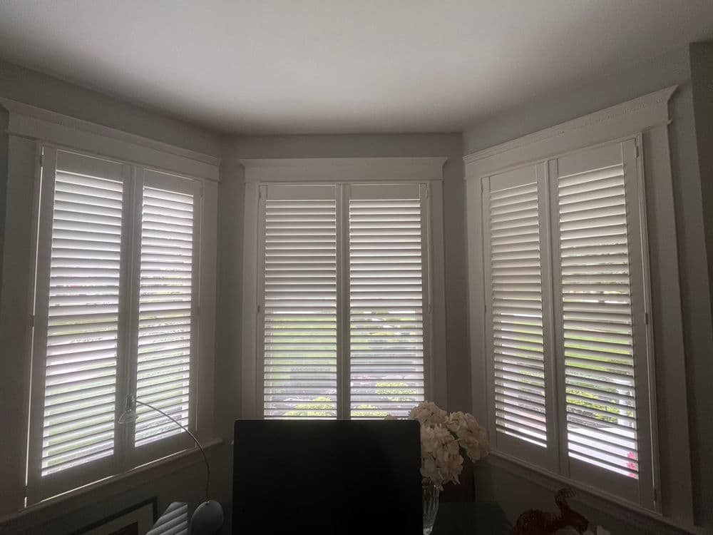 Gallery photos for Plantation Shutters Installed Across Two Bay Windows: Image #1